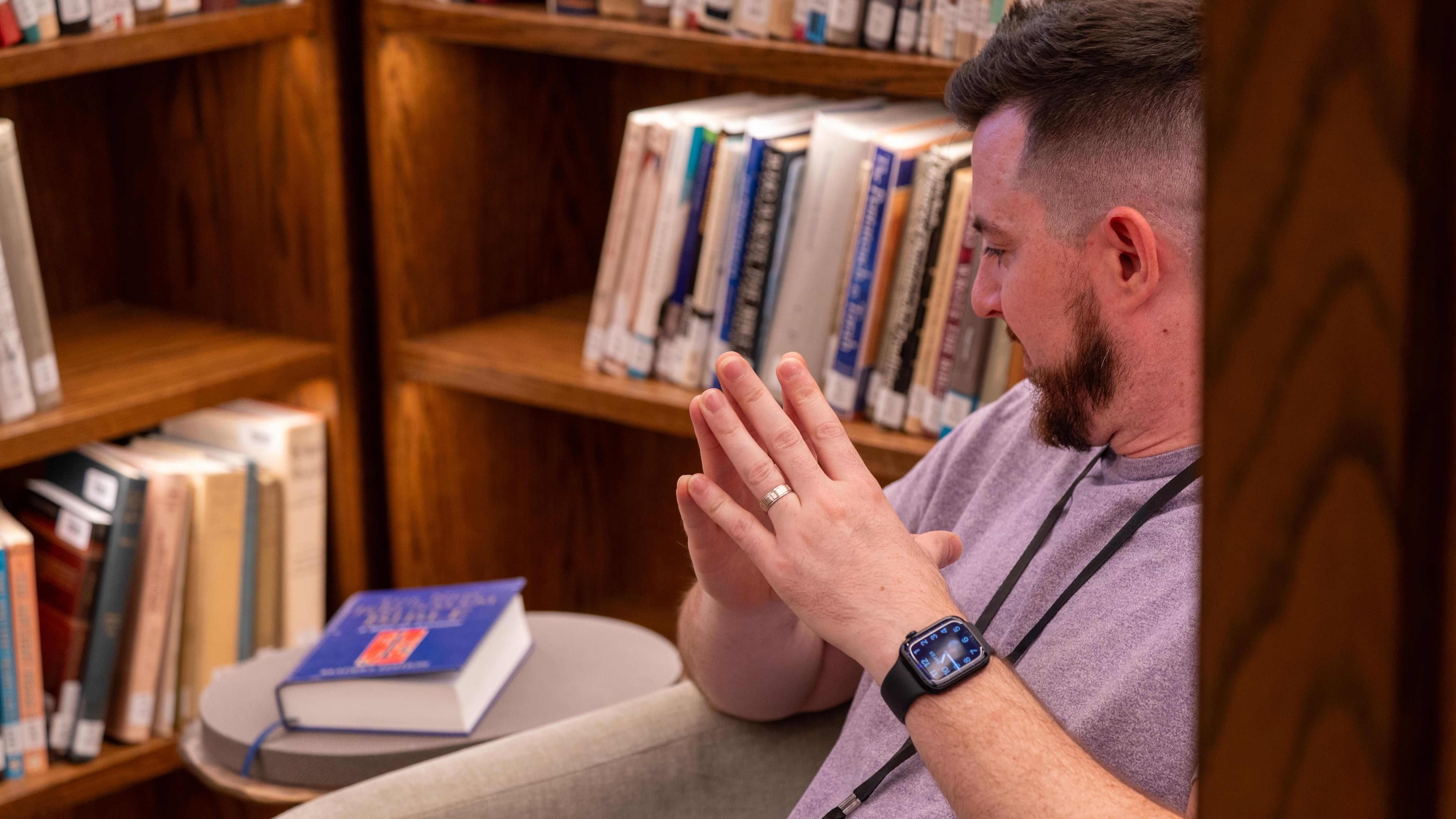Logos student sits in the Yarnton Manor Library in Oxford, England.